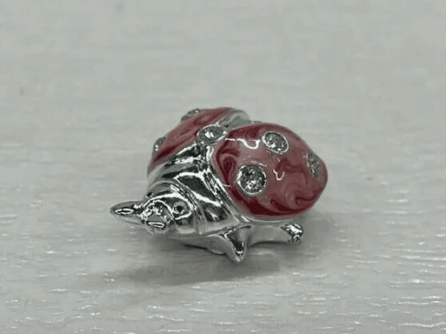 coccinelle strass rose et argent