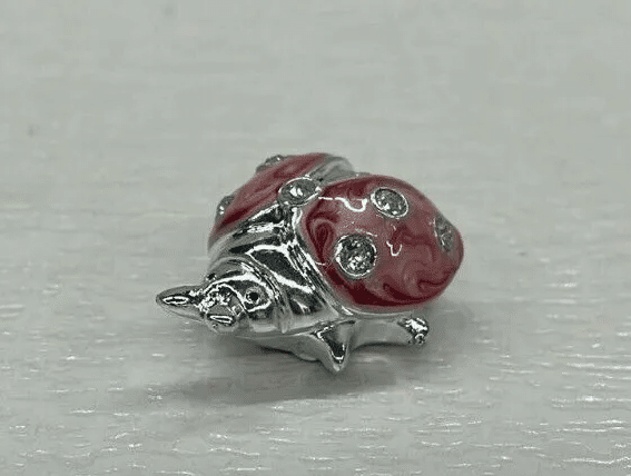 coccinelle strass rose et argent